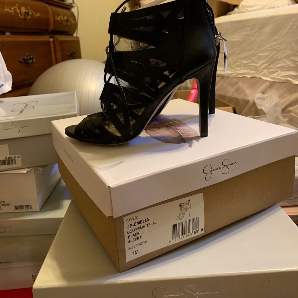Black caged heels. New with box and tag
